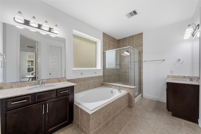 2206 Hidden Meadow Ln, Pearland, TX 77089 - full bath with two vanities, a shower stall, a bath, tile patterned flooring, and baseboards