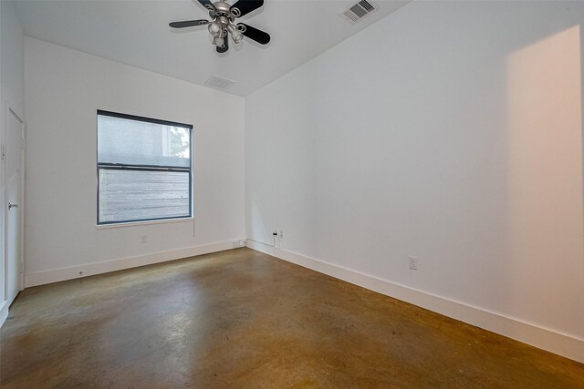 5012 Cornish St, Houston, TX 77007 - spare room with concrete floors, baseboards, and a ceiling fan