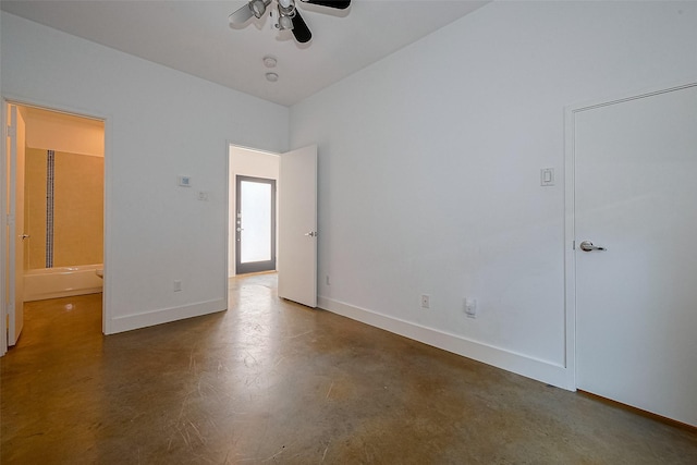 5012 Cornish St, Houston, TX 77007 - empty room with finished concrete flooring, baseboards, and ceiling fan
