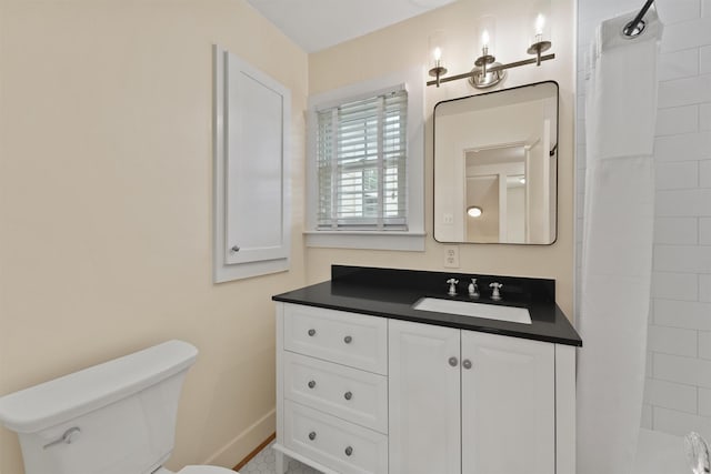 2044 Branard St, Houston, TX 77098 - full bathroom with vanity, toilet, a shower with curtain, and baseboards