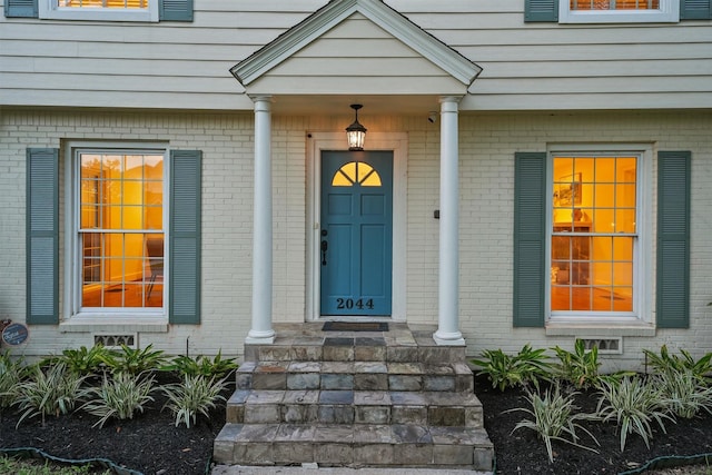 2044 Branard St, Houston, TX 77098 - doorway to property with brick siding