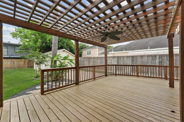 2044 Branard St, Houston, TX 77098 - wooden deck with a pergola, ceiling fan, and an outbuilding