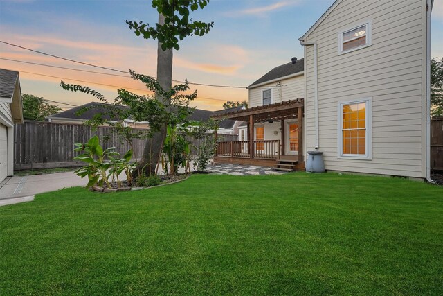 2044 Branard St, Houston, TX 77098 - yard at dusk featuring a pergola and a deck