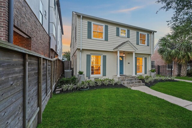 2044 Branard St, Houston, TX 77098 - colonial inspired home with brick siding and central AC unit