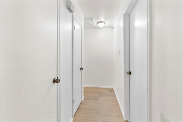 8903 Roos Rd, Houston, TX 77036 - hallway with light wood-style floors and baseboards