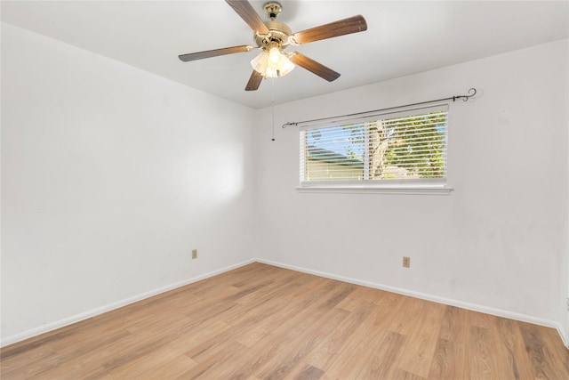 8903 Roos Rd, Houston, TX 77036 - spare room with light wood finished floors, baseboards, and ceiling fan