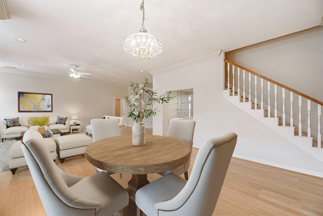 13223 Oregold Dr, Houston, TX 77041 - dining space with ceiling fan, light wood-style floors, stairway, ornamental molding, and a chandelier