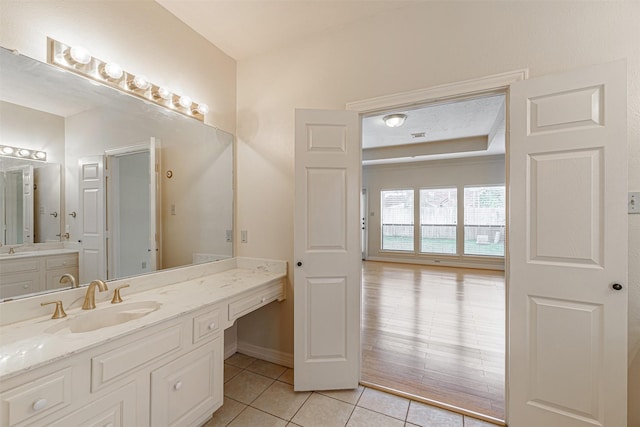 13223 Oregold Dr, Houston, TX 77041 - bathroom featuring tile patterned flooring, vanity, and baseboards
