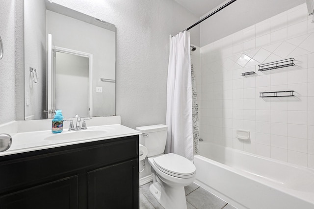 2507 Ocean Pass Ln, Richmond, TX 77469 - full bathroom featuring toilet, vanity, a textured wall, shower / bath combo, and tile patterned floors