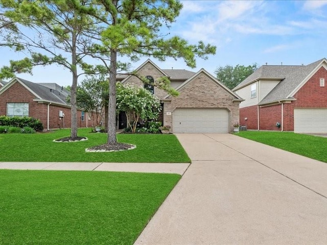 9622 Hanging Moss Trl, Houston, TX 77064 - traditional-style house featuring driveway, brick siding, a front lawn, and a garage