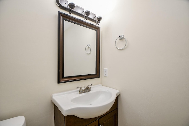 2367 Briarwest Blvd, Houston, TX 77077 - half bathroom featuring vanity and toilet