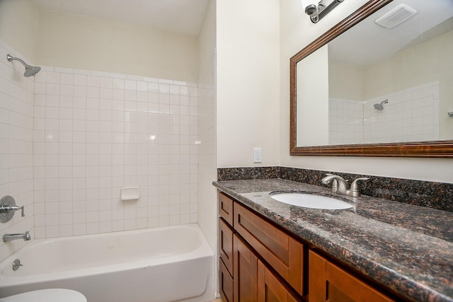 2367 Briarwest Blvd, Houston, TX 77077 - bathroom featuring vanity, shower / tub combination, and toilet