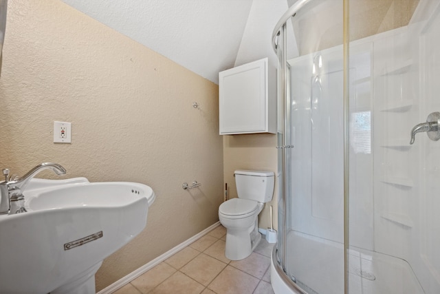 806 Quintana Roo Pl, Seabrook, TX 77586 - full bathroom with a sink, a stall shower, tile patterned flooring, toilet, and lofted ceiling