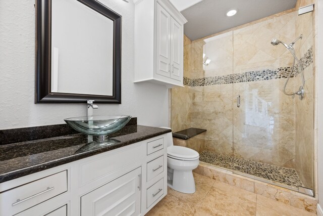 806 Quintana Roo Pl, Seabrook, TX 77586 - bathroom featuring a stall shower, vanity, toilet, and recessed lighting