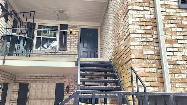 7900 Westheimer Rd Unit 228, Houston, TX 77063 - property entrance featuring brick siding