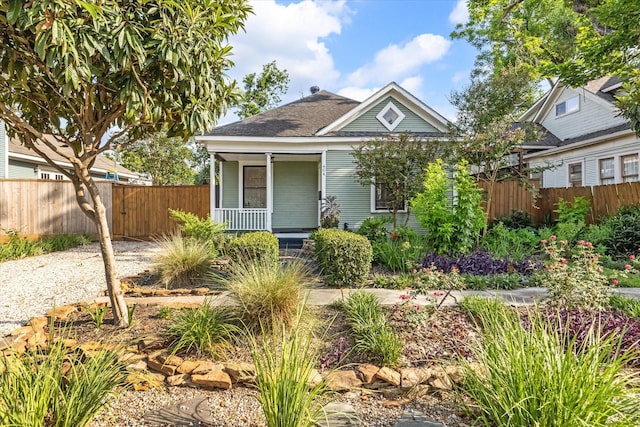 404 E 28th St, Houston, TX 77008 - view of front facade featuring a porch and roof with shingles