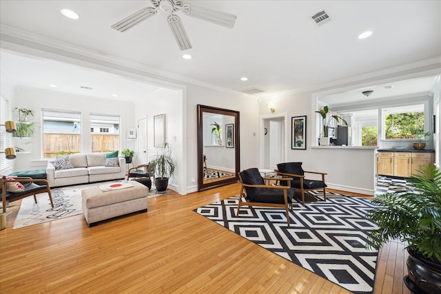 404 E 28th St, Houston, TX 77008 - living area with hardwood / wood-style floors, ceiling fan, baseboards, recessed lighting, and crown molding