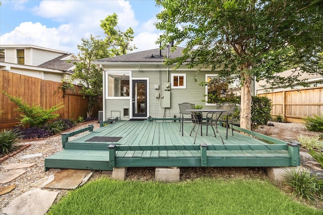 404 E 28th St, Houston, TX 77008 - back of house featuring a fenced backyard, a deck, outdoor dining area, and a shingled roof