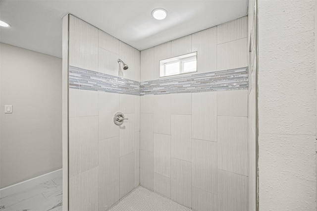 702 Norell St, Channelview, TX 77530 - full bathroom with a tile shower and marble finish floors