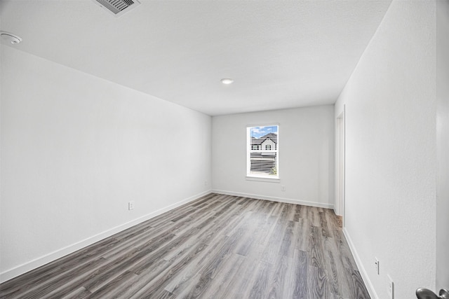 12305 Brandenburg Gate Dr, Houston, TX 77047 - spare room with wood finished floors and baseboards