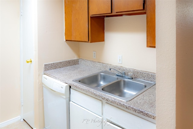 12500 Sandpiper Dr Unit 76, Houston, TX 77035 - kitchen with dishwasher, a sink, and light countertops