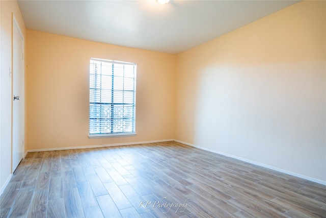 12500 Sandpiper Dr Unit 76, Houston, TX 77035 - spare room with wood finished floors and baseboards