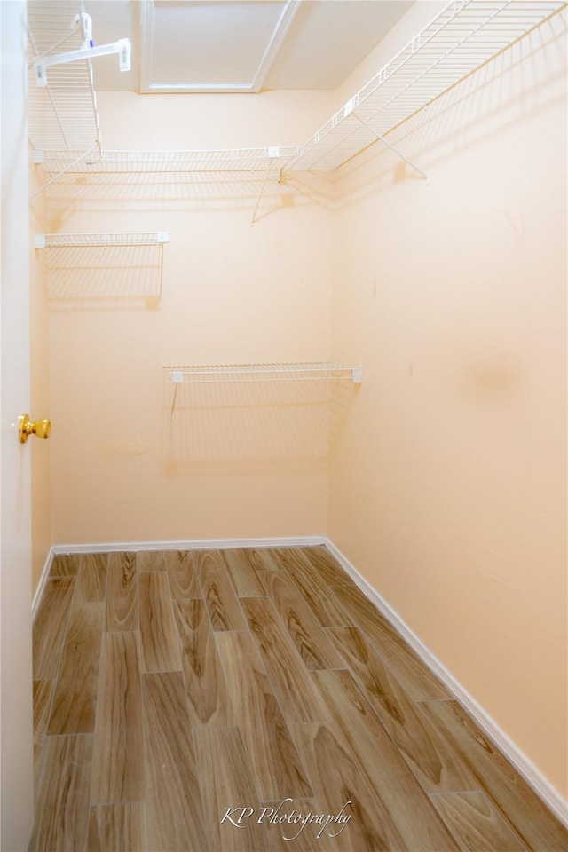 12500 Sandpiper Dr Unit 76, Houston, TX 77035 - spacious closet featuring wood finished floors