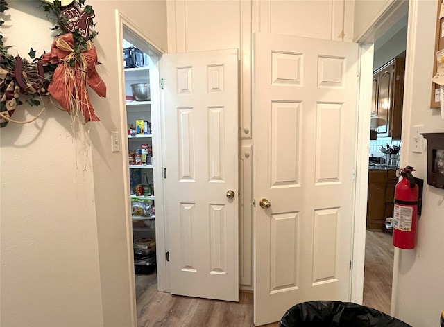 11683 Lakeshore Dr, Thornton, TX 76687 - hallway featuring wood finished floors