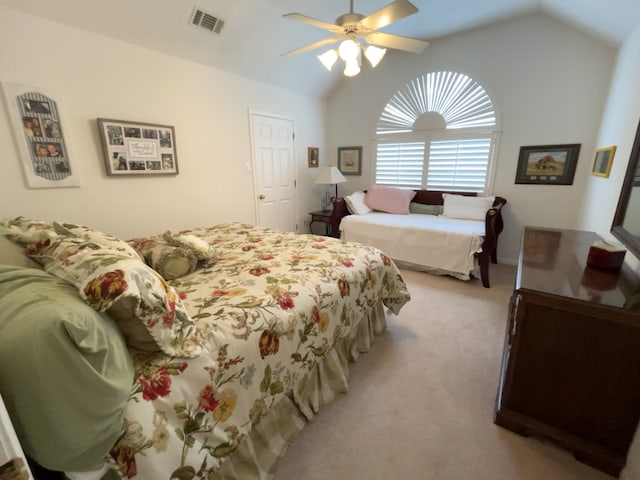 11683 Lakeshore Dr, Thornton, TX 76687 - bedroom featuring light carpet, vaulted ceiling, and a ceiling fan