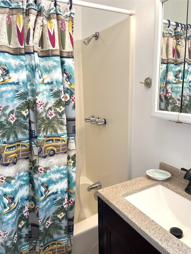 11683 Lakeshore Dr, Thornton, TX 76687 - full bathroom with vanity and shower / bath combo with shower curtain