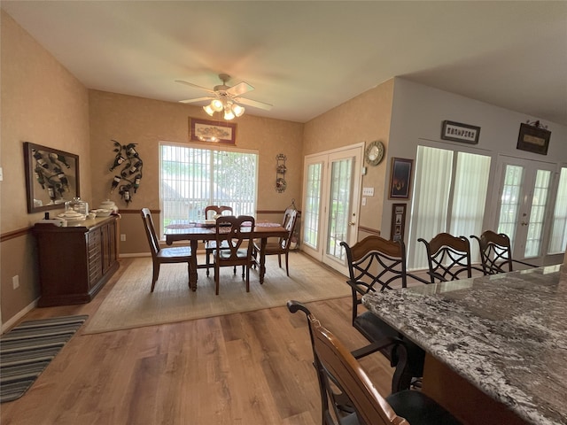 11683 Lakeshore Dr, Thornton, TX 76687 - dining space featuring light wood-style floors, a ceiling fan, baseboards, and french doors