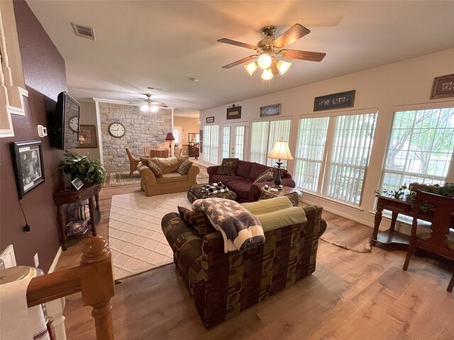 11683 Lakeshore Dr, Thornton, TX 76687 - living room featuring ceiling fan, healthy amount of natural light, and wood finished floors