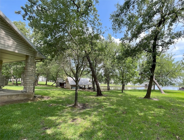 11683 Lakeshore Dr, Thornton, TX 76687 - view of grassy yard featuring a water view