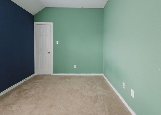 4615 Long Climb Cyn, Humble, TX 77396 - unfurnished room with light colored carpet, lofted ceiling, and baseboards