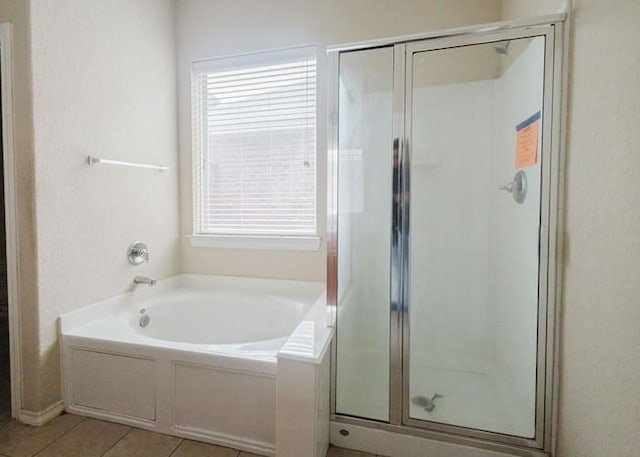 4615 Long Climb Cyn, Humble, TX 77396 - full bathroom with plenty of natural light, a stall shower, a garden tub, and tile patterned flooring