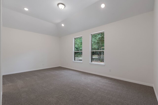 24696 Wicklow Rd, Hempstead, TX 77445 - unfurnished room featuring dark colored carpet, vaulted ceiling, baseboards, and recessed lighting