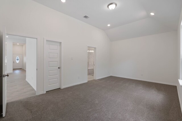 24696 Wicklow Rd, Hempstead, TX 77445 - unfurnished bedroom featuring carpet flooring, vaulted ceiling, recessed lighting, baseboards, and ensuite bathroom