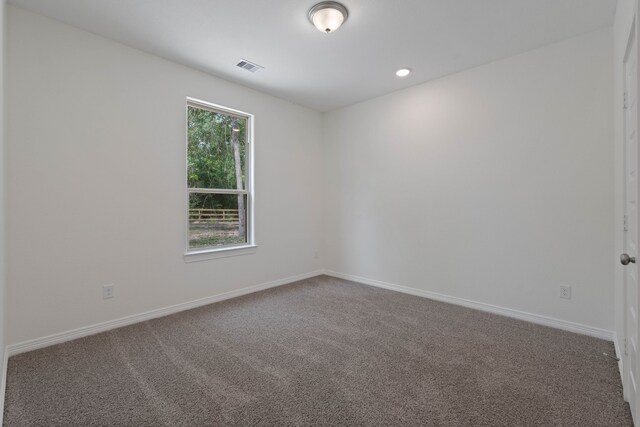 24696 Wicklow Rd, Hempstead, TX 77445 - unfurnished room with carpet floors, baseboards, and recessed lighting