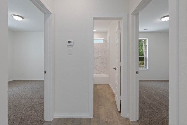 24696 Wicklow Rd, Hempstead, TX 77445 - hallway featuring baseboards
