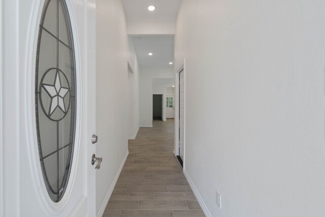 24696 Wicklow Rd, Hempstead, TX 77445 - hall featuring baseboards, recessed lighting, and light wood-style floors
