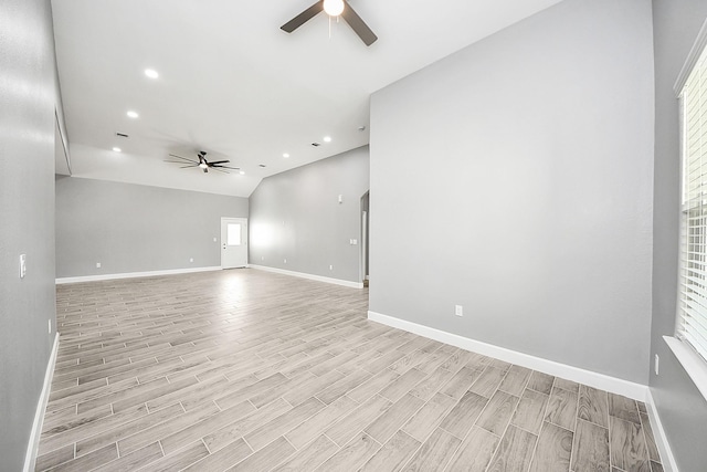 2448 Areba St, Houston, TX 77091 - empty room with a ceiling fan, light wood-type flooring, baseboards, recessed lighting, and lofted ceiling