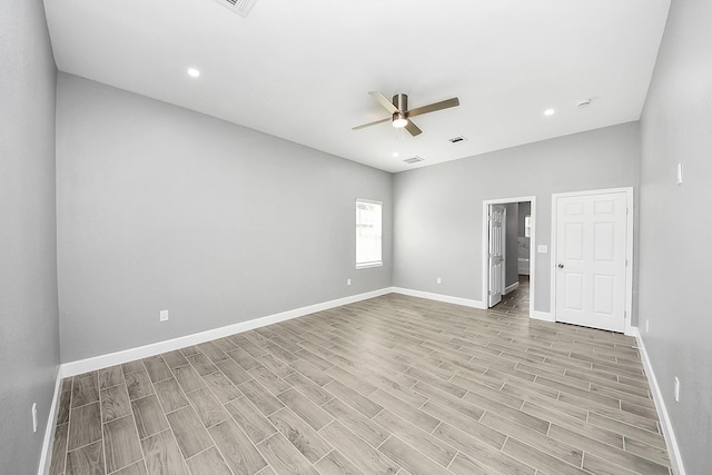 2448 Areba St, Houston, TX 77091 - unfurnished room featuring a ceiling fan, light wood-style floors, baseboards, and recessed lighting