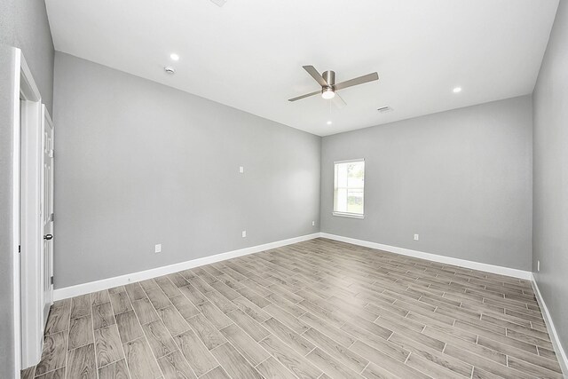 2448 Areba St, Houston, TX 77091 - spare room featuring a ceiling fan, light wood-style floors, baseboards, and recessed lighting