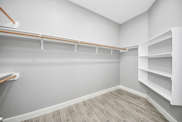 2448 Areba St, Houston, TX 77091 - walk in closet featuring wood finished floors