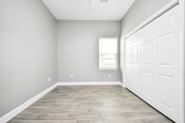 2448 Areba St, Houston, TX 77091 - unfurnished bedroom featuring wood finish floors, baseboards, and a closet