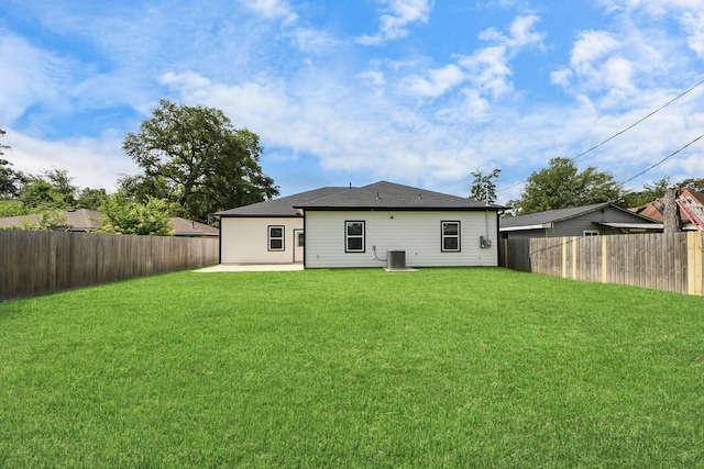 2448 Areba St, Houston, TX 77091 - back of house featuring a patio area and central AC