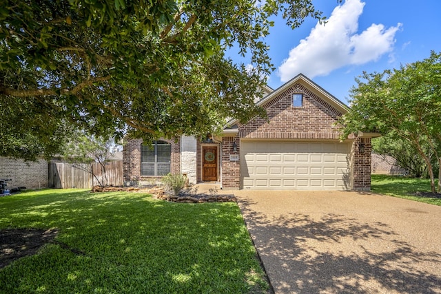 3919 Incourt Ln, College Station, TX 77845 - obstructed view of property featuring a garage, concrete driveway, and brick siding