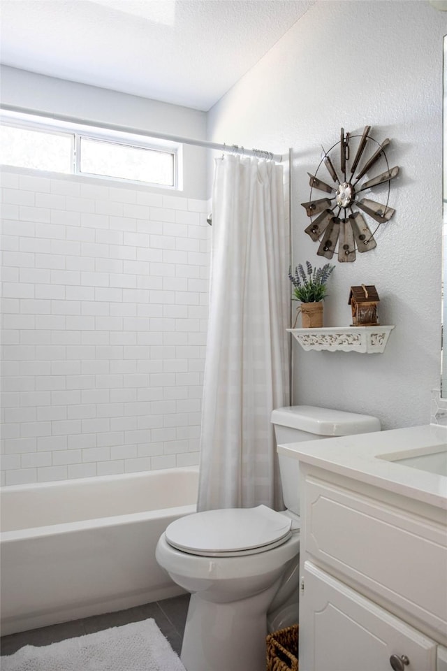 300 Coventry Rd, Spicewood, TX 78669 - full bath featuring toilet, vanity, tile patterned flooring, and shower / tub combo