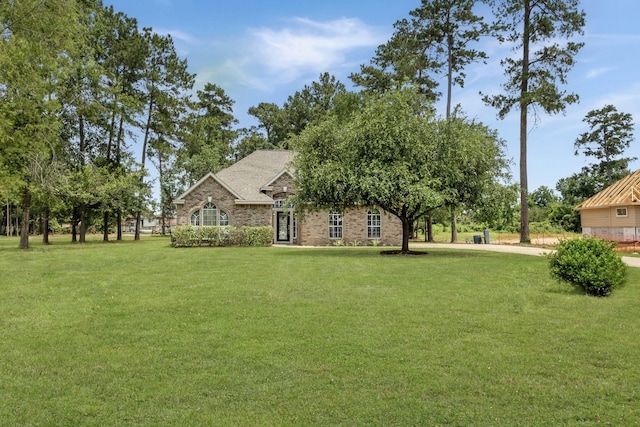 22618 Trailwood Ln, Tomball, TX 77375 - view of green lawn