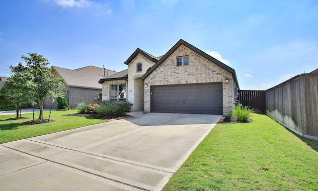 24618 Songlark Bend Dr, Tomball, TX 77375 - french country home featuring brick siding and concrete driveway